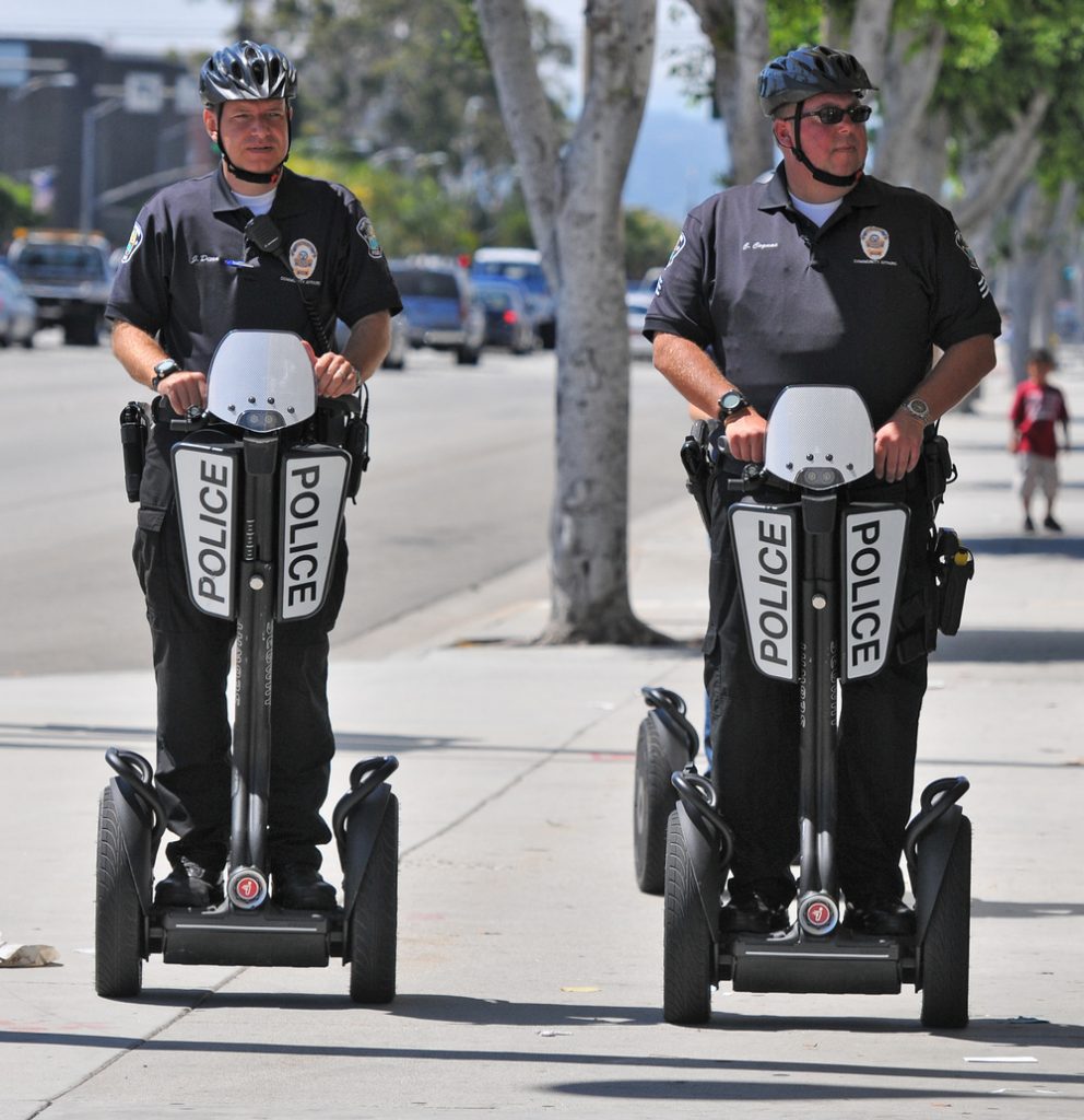 Police riding Segways.